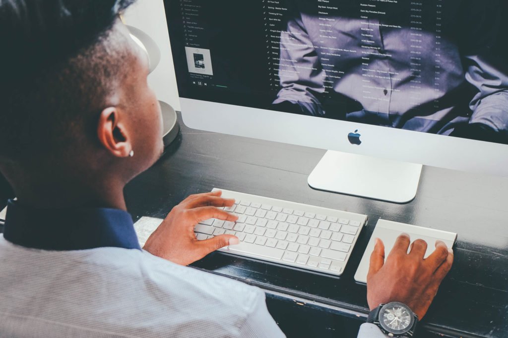 man sitting at desk