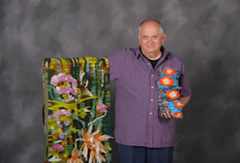 Kent State senior guest student John Read displays artwork that he learned how to design while taking classes at Kent State. Kent State's Senior Guest Program allows senior citizens like Read to attend regular, on-campus classes on a tuition-free basis