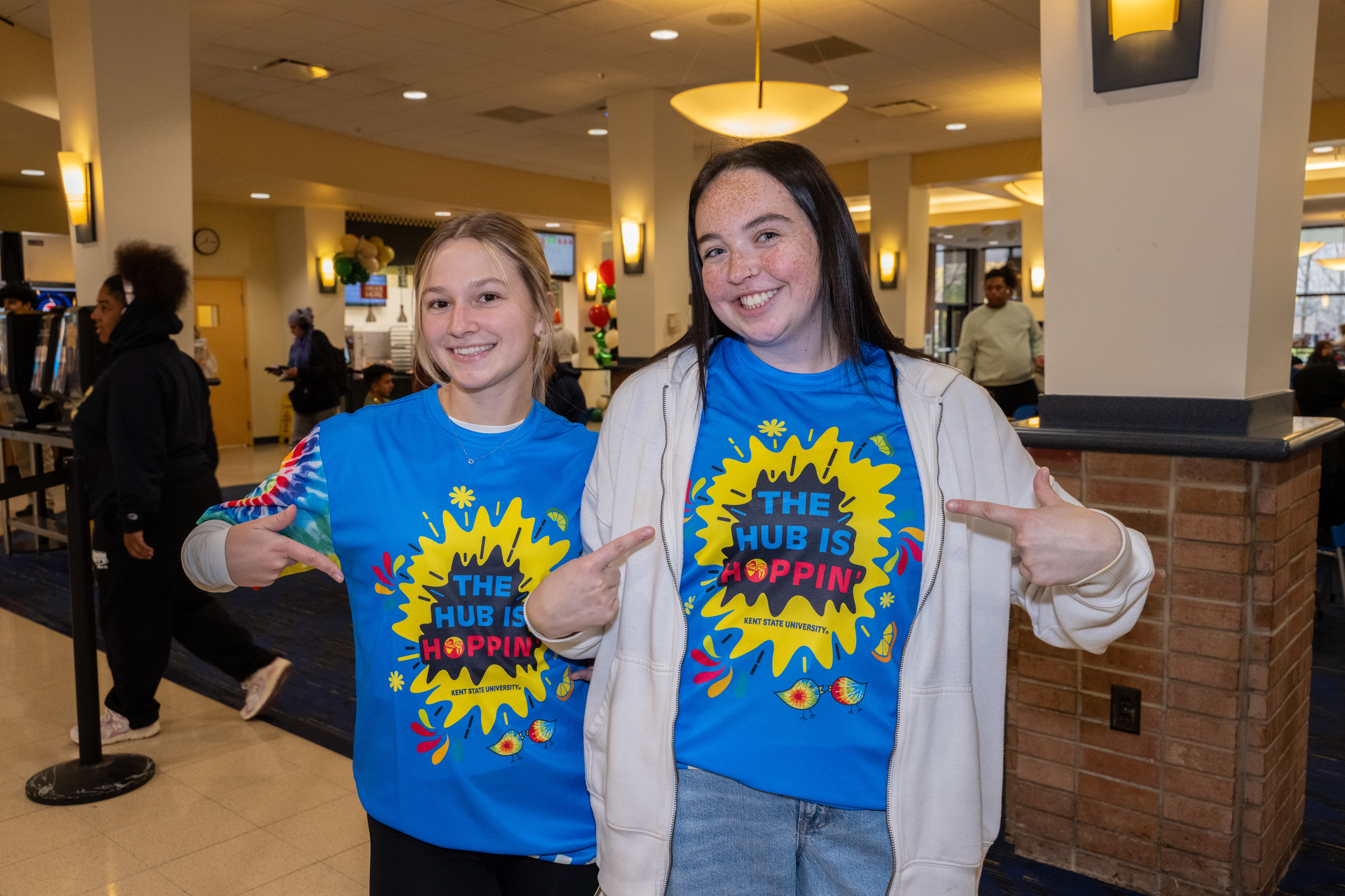 Student marketing team, smiling and posing at the Hub is hopin' event