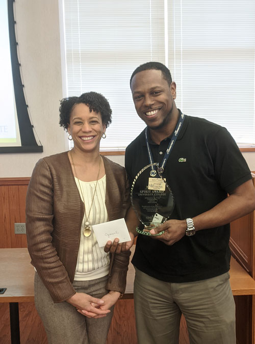 Jimmal Ball, winner of the Spirit of UC Award, with Dean Eboni Pringle