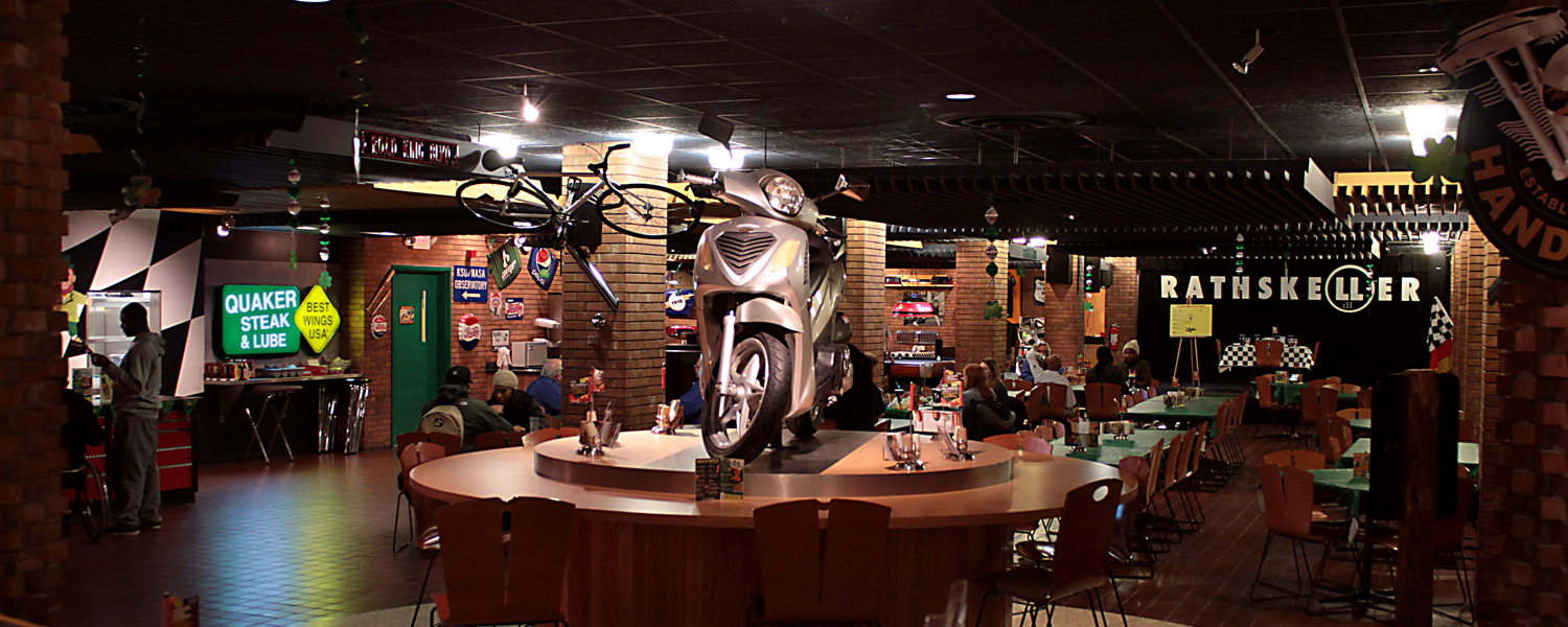 A moped sits on top of one of the lounge tables in Quaker Steak and Lube