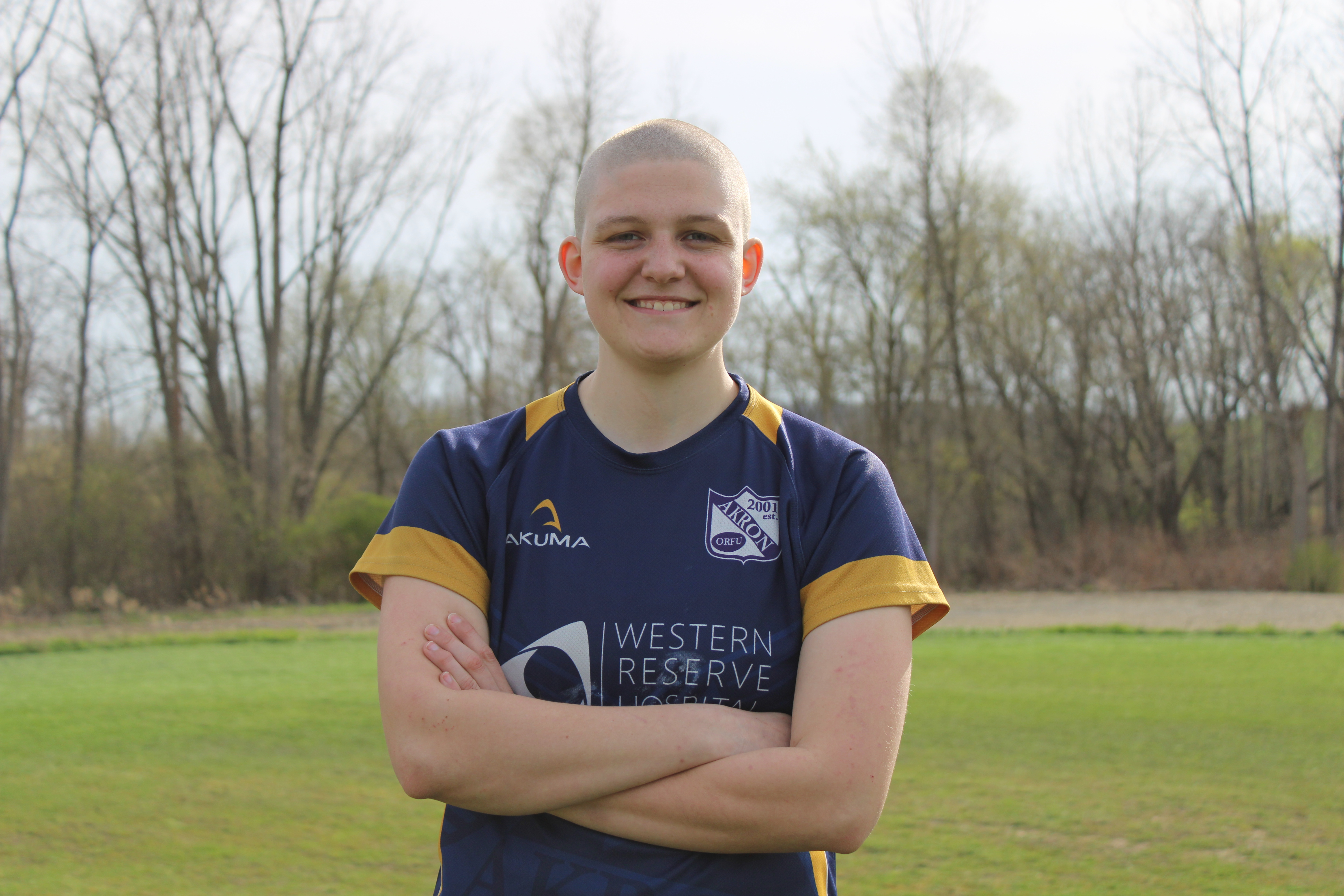 A photo of Sam in her rugby uniform