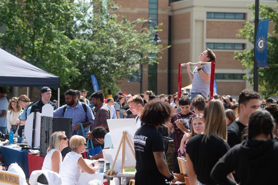 Scene of students enjoying a past Black Squirrel Festival 