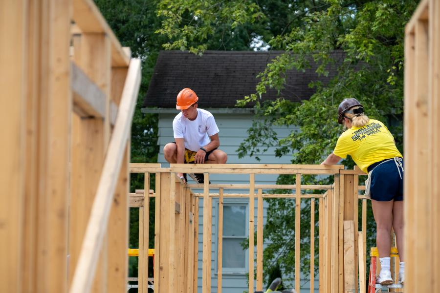 Students building houses