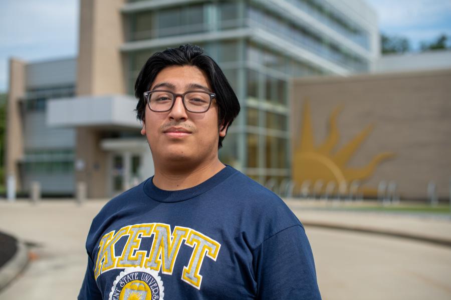 Student stands in front of building at the Twinsburg Academic Center