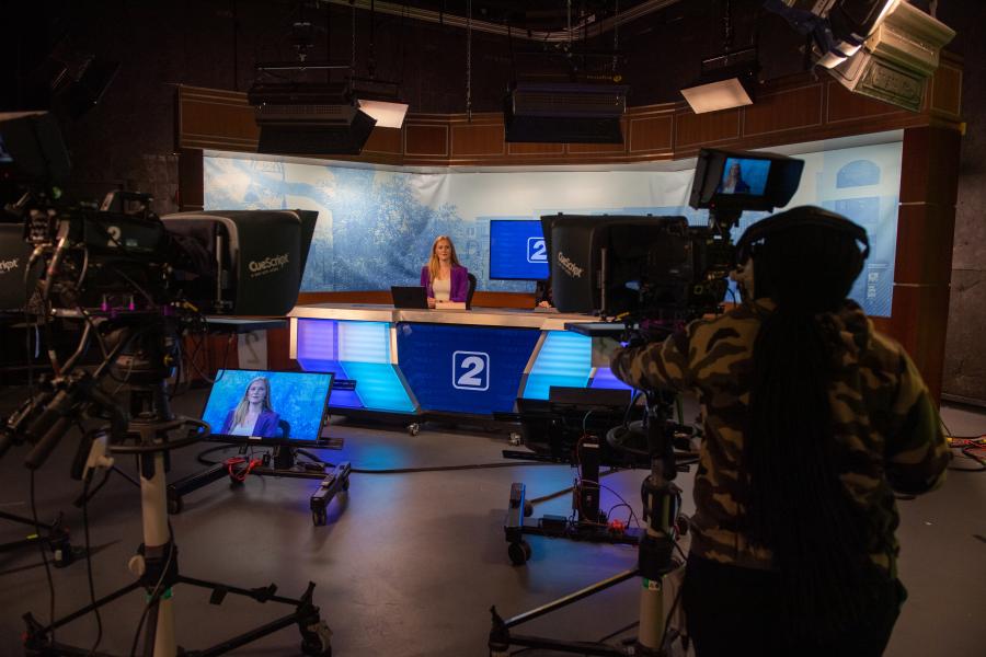 Student Media students on news set for KSTV