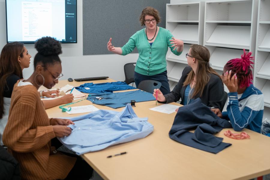 Rachel LoMonaco-Benzing, Ph.D. teaching in a classroom of students