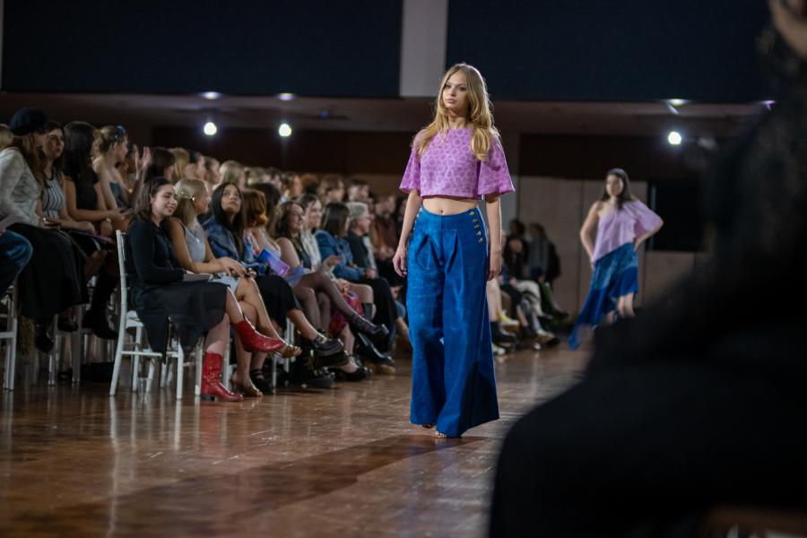 model walking down the runway
