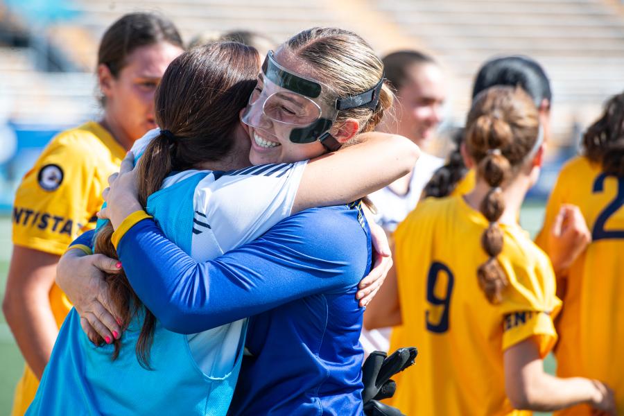 Members of the Kent State Soccer team celebrate a victory at Dix Stadium