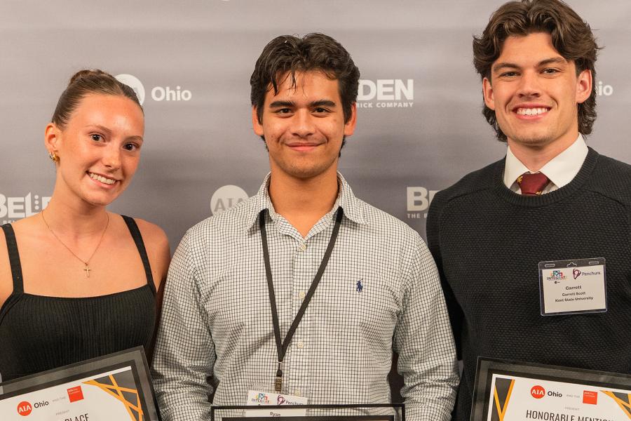 Three Architecture students holding AIA Ohio Awards at the ceremony
