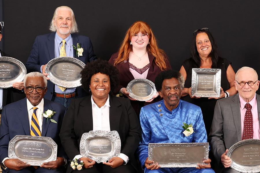 Pictured are the 2025 Vlogƽ Alumni Award winners at the awards ceremony, held Oct. 10 during Homecoming weekend at the Vlogƽ Hotel and Conference Center in Kent, Ohio. (Photo credit: Scott R. Galvin)
