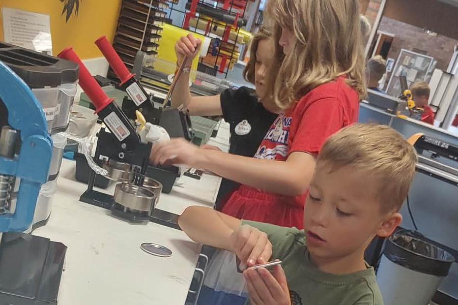 Kids participating in Summer Fun at the Library/Makerspace