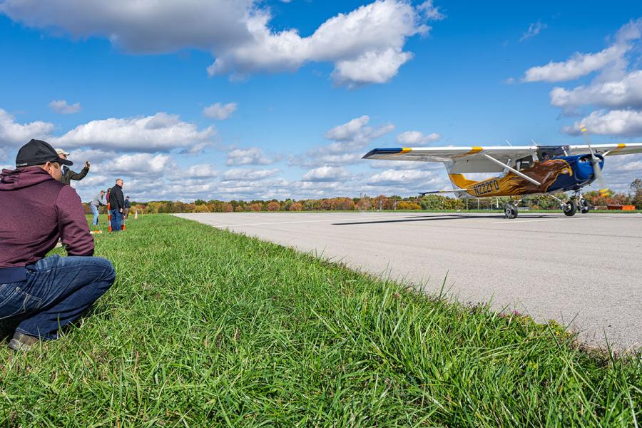 A plane lands on the tarmac at Kent State Airport
