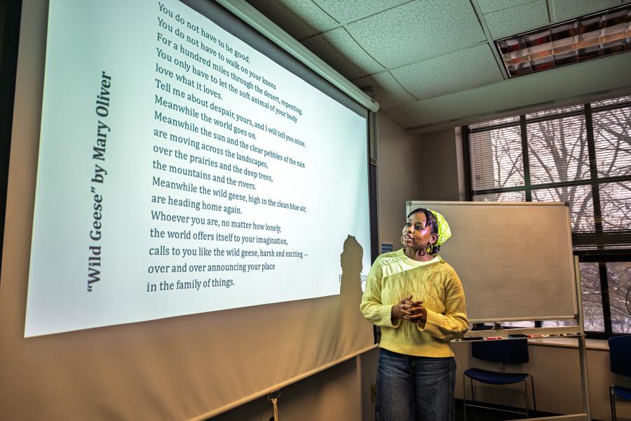 A student in Clare Stacey's class discusses a poem in Merrill Hall