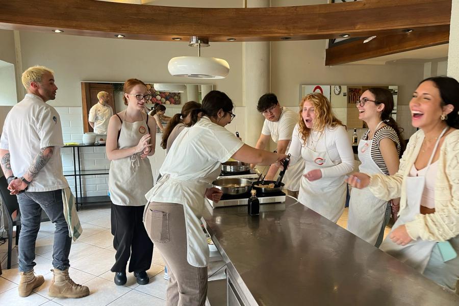 Students hard at work in a cooking class in Florence, Italy.