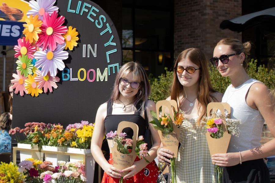 2026 Earth Fest Lifestyle in Bloom flowers and students