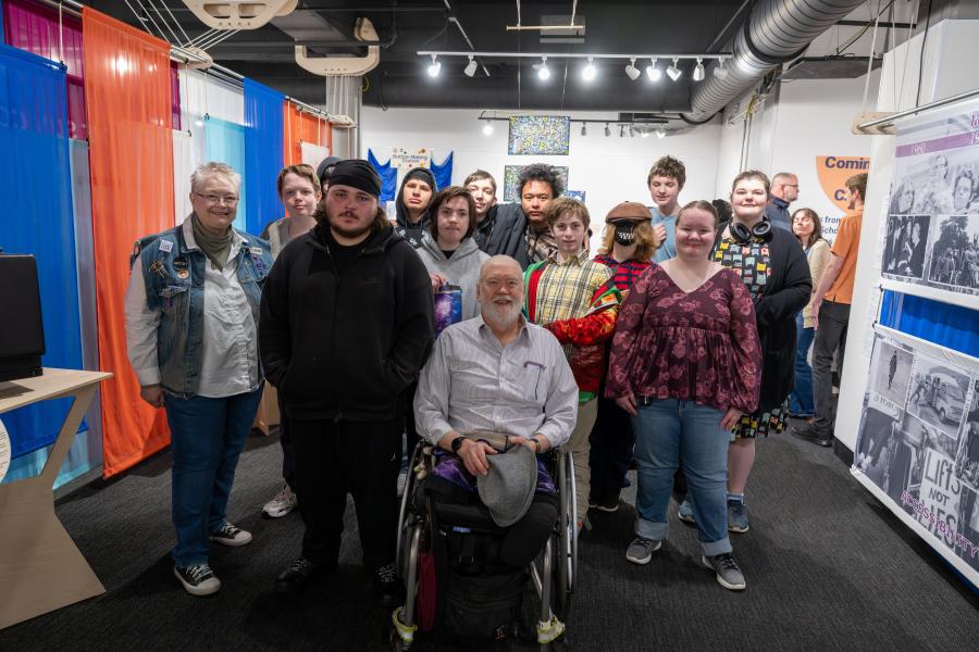 Dean Kahler with student artists who contributed to his May 4 exhibit.