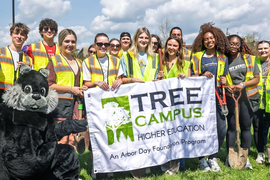 Volunteers pose during Arbor_Day_Planting_2026