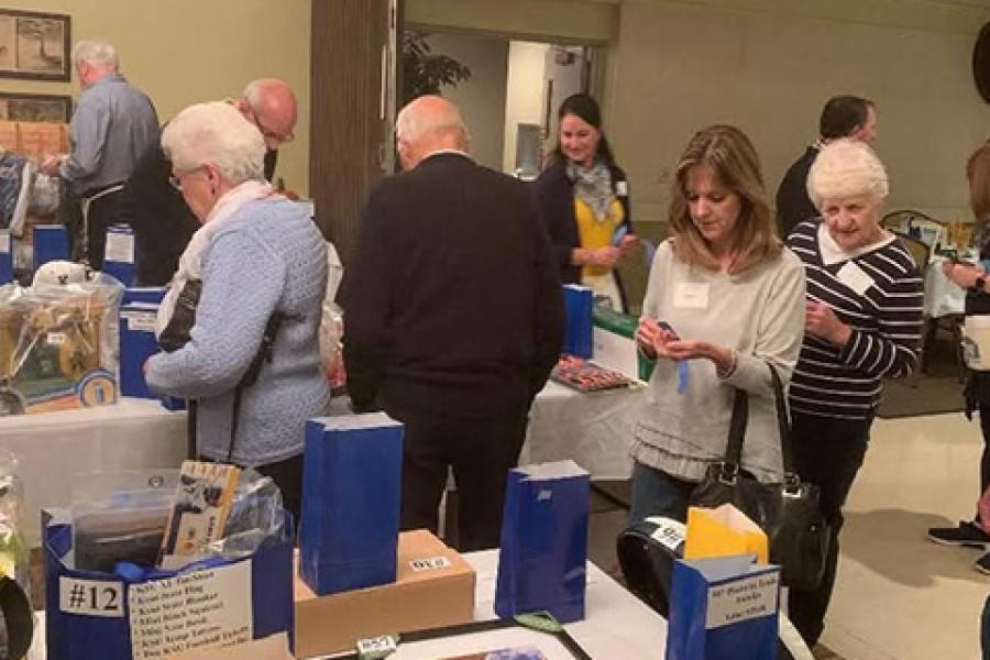 Members of the Lake County Alumni group gather at their annual pasta dinner