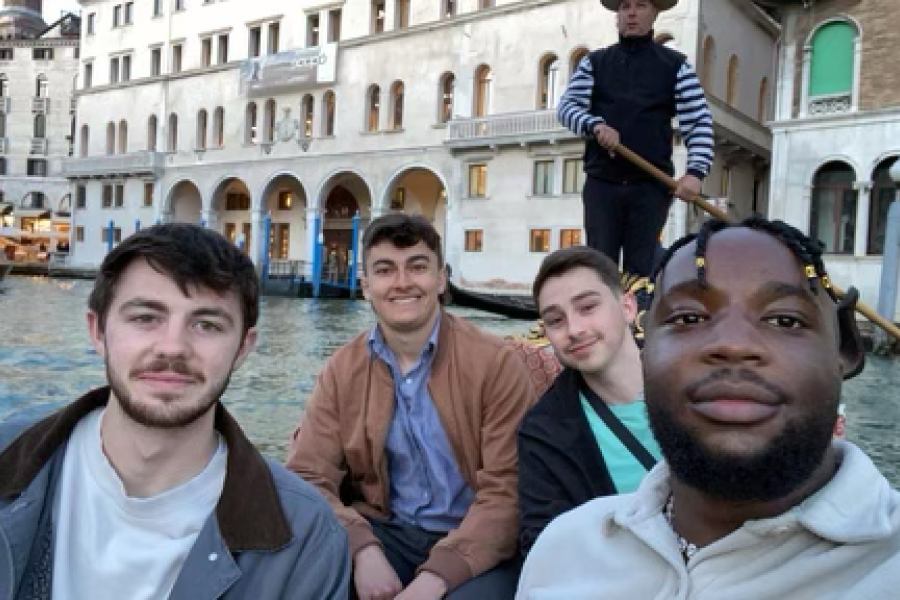 Joshua posing with fellow students while studying abroad