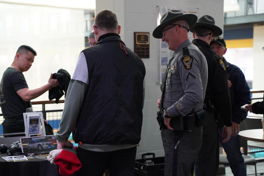 State Trooper and patron laughing