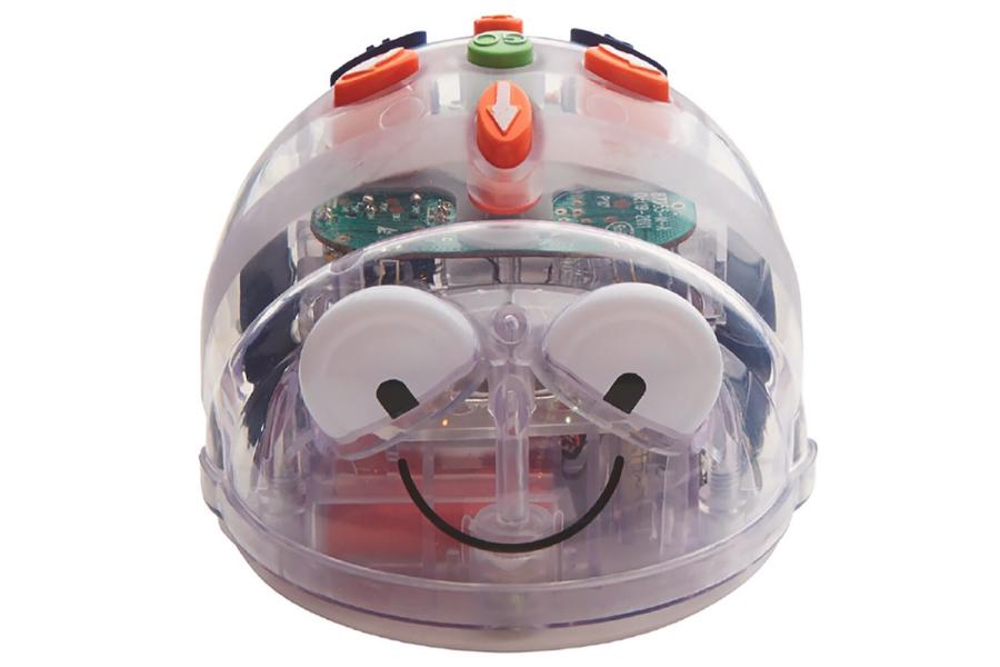 small robot with big eyes and a smile