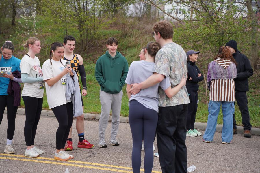 Group of young adults taking a photo after the race
