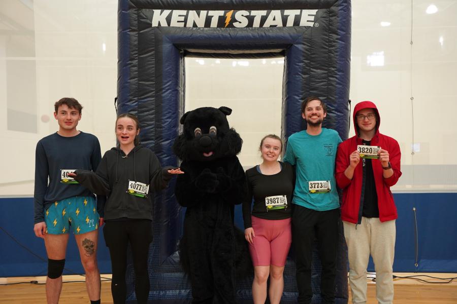 Group photo with black squirrel mascot
