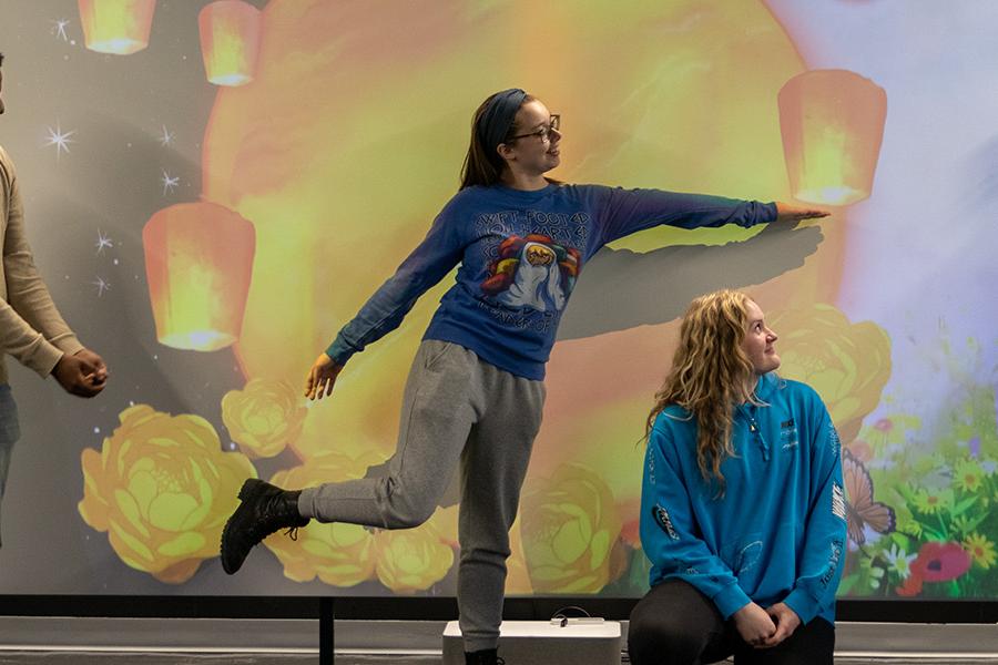 Photo of students demonstrating an augmented reality exhibit