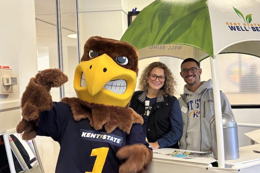 Dominic & Lettie posing at the Well Hut with Flash for the Mental Health Awareness Month activities at the Pepsi Leadership Center's Homecoming Flash Friday