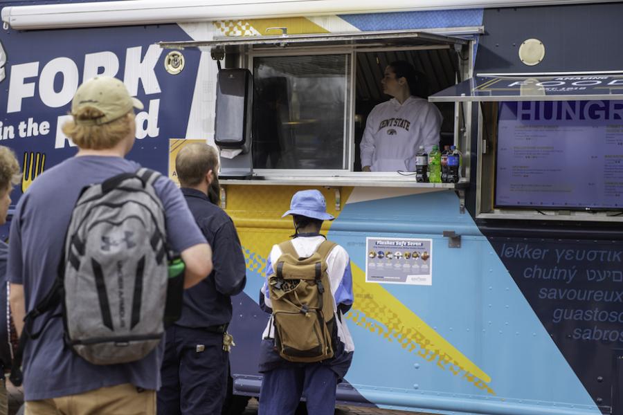 Students in line at Fork in the Road 2023 Food Truck Series 