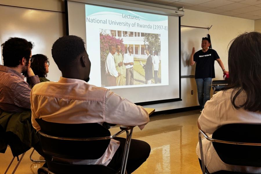 Photo by Julie Mazzei of Dr. Tatsushi Arai giving a lecture about functional coexistence.