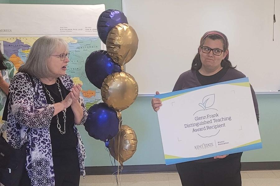 Jessica Leveto, Ph.D., receiving the 2025 Glenn Frank Distinguished Teaching Award