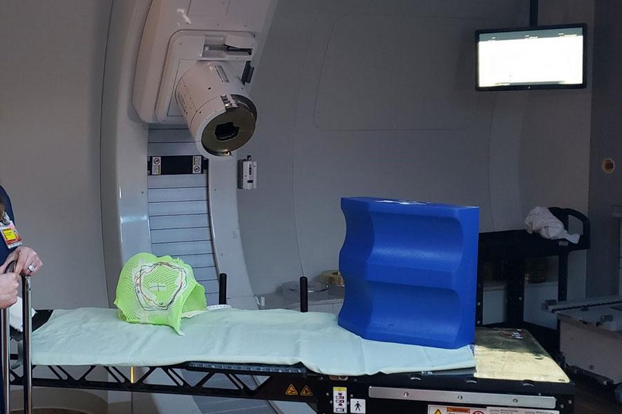 Jill Cofojohn in a proton therapy treatment room.