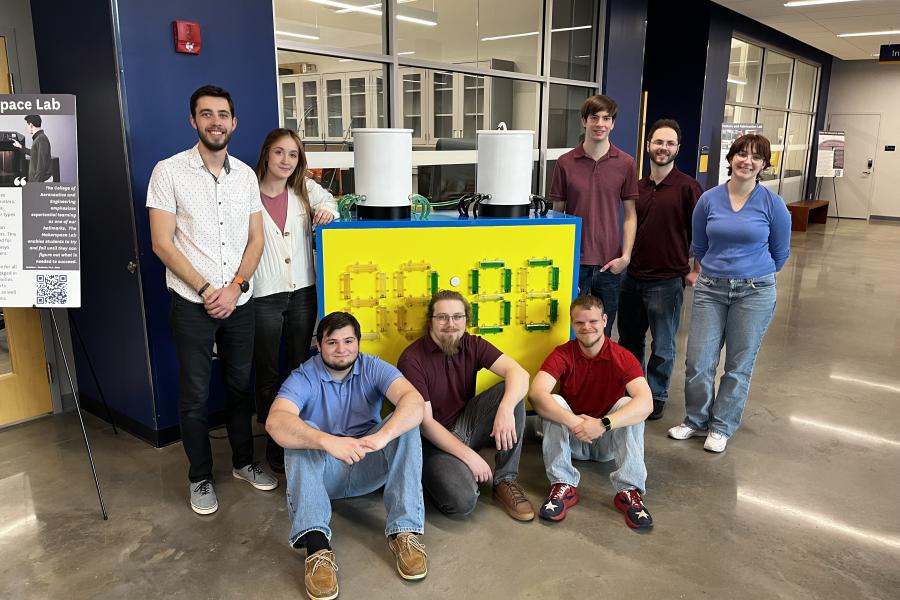 Nicholas Baird with a group of engineering students