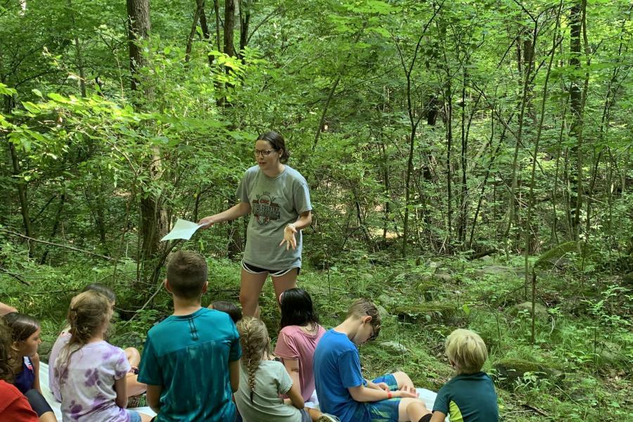 Olivia teaching kids at camp