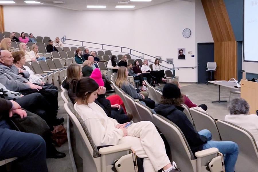 A nursing graduate student addresses the attendees of the fall 2024 interdisciplinary policy panel.