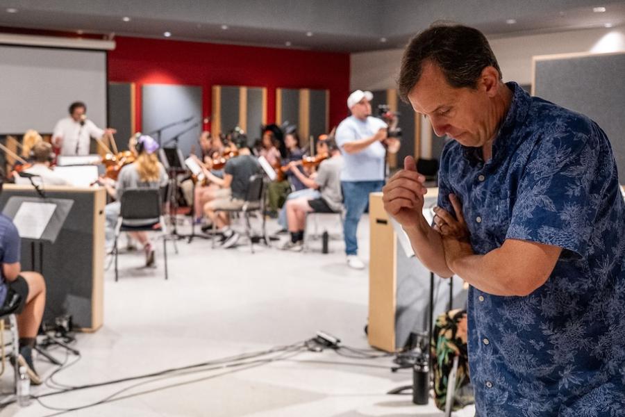 Scott Hallgren listens during Kent State collaboration for film score