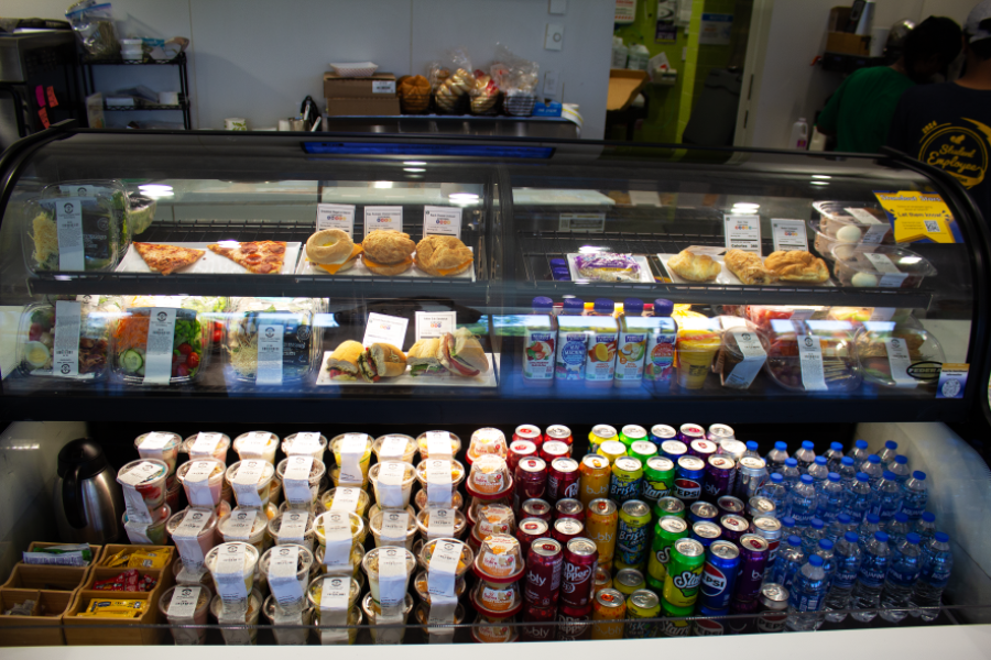 Close up of the cooler case displaying available food and beverage items at the Simon Café