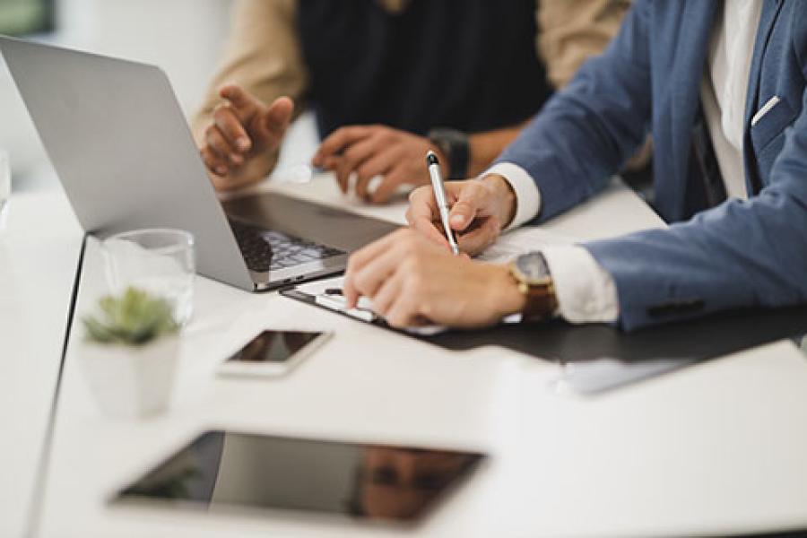 Business men at computer