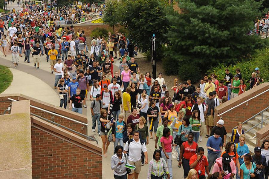 Students walk along the university esplanade
