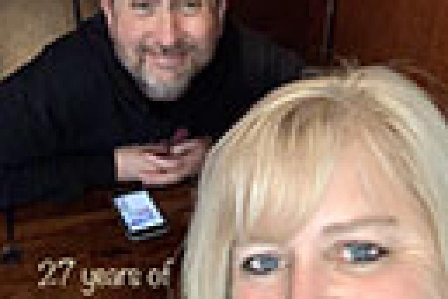 Staci and Brad Conley, posed and smiling