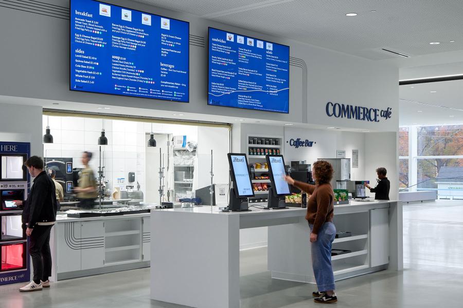 showing commerce cafe and student ordering on kiosk and student picking up food from lockers