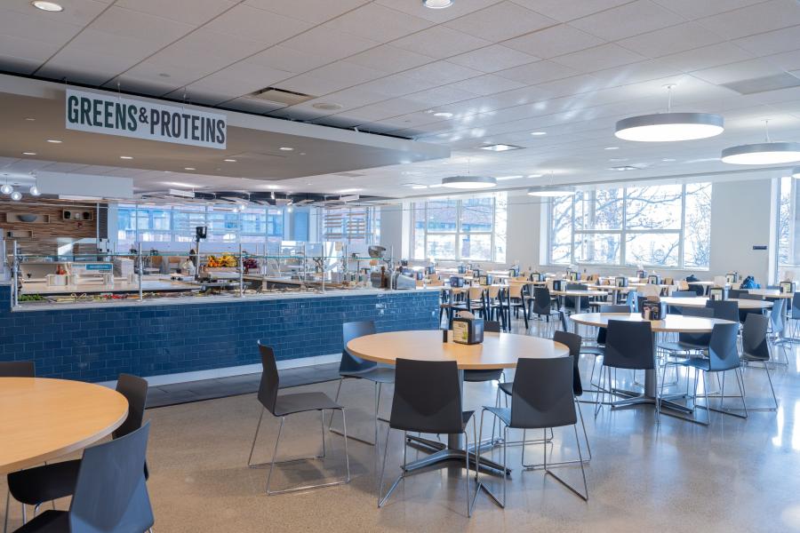 View of Eastway's "Greens & Proteins" area, with lots of available seating around the station