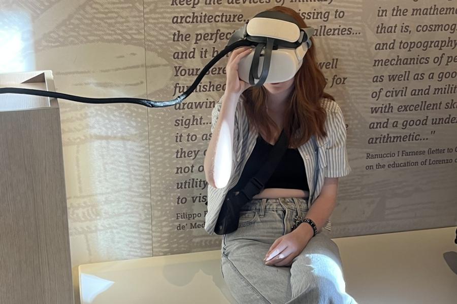An Exploratory student wears a virtual reality headset at the Galileo Museum in Florence, Italy.