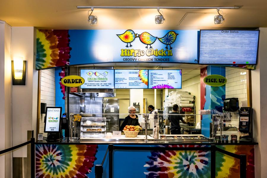 Front view of Hippie Chick'n counter, including the order station, prep counter, and menu boards