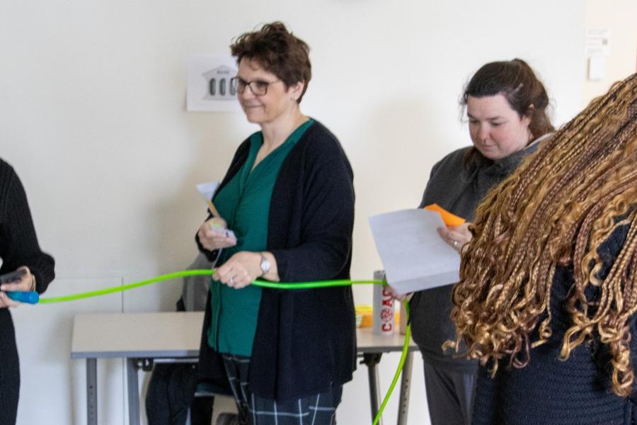 Students participate in a poverty simulation