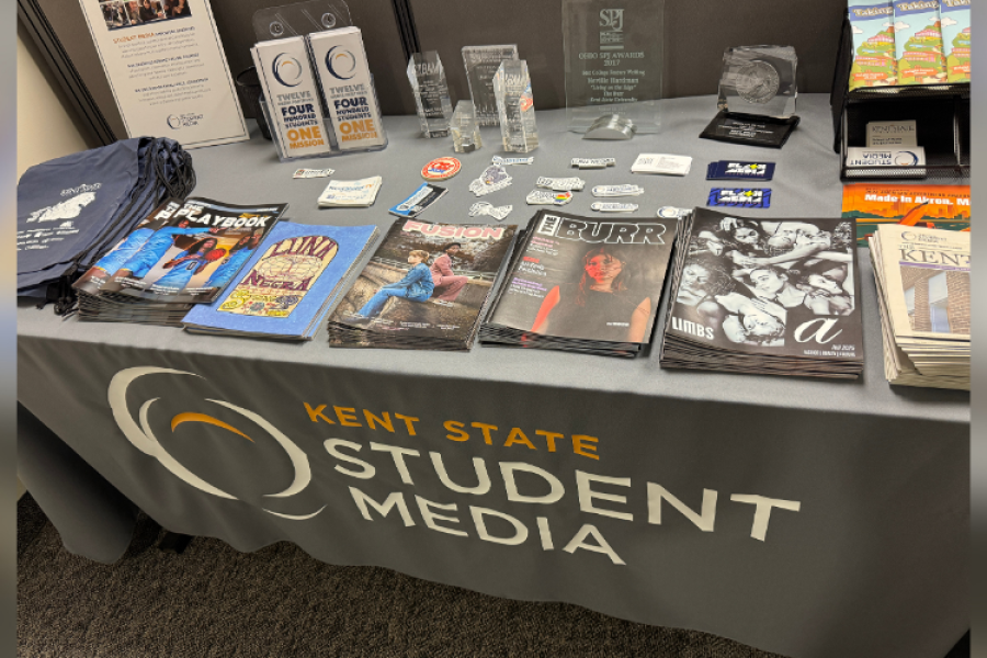 A student media information table displaying copies of all the recent magazines