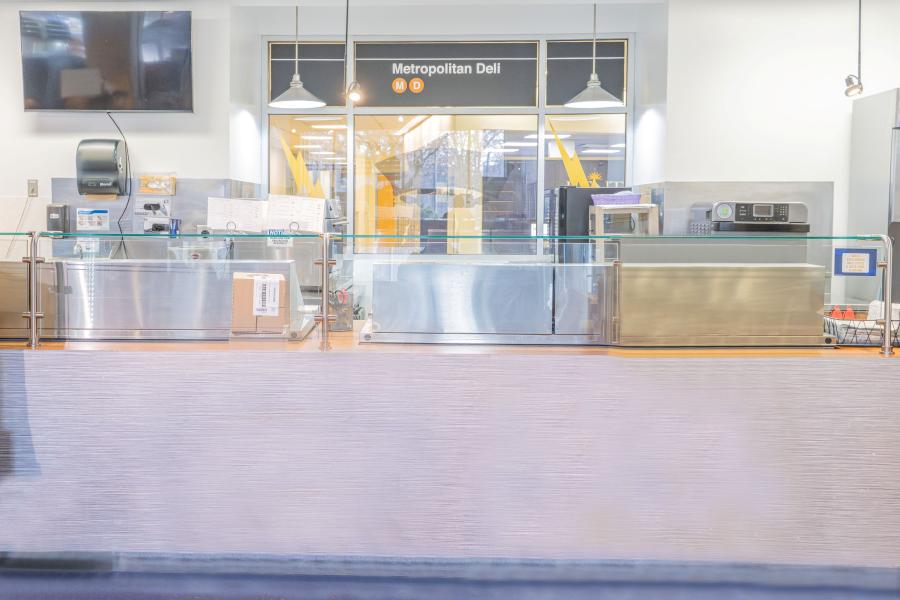 Front view of prep counter/kitchen area of Metropolitan Deli