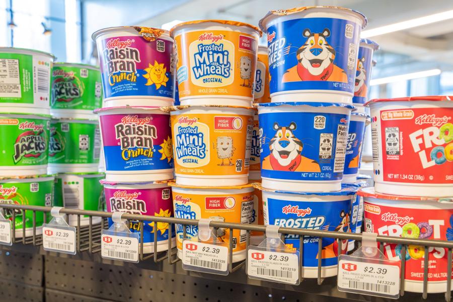 Close up of a stack of to-go cups of various cereals available for purchase at Rosie's Market